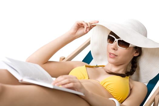 Beach - Young woman in bikini relax with book
