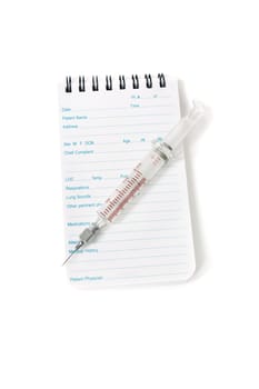 Medical notebook and syringe needle