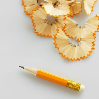 sharpened pencil on white background. High angle view