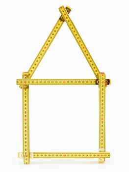 folding ruler whit house shape on white background