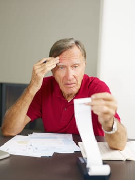 Senior man worried about his home finances. Copy space