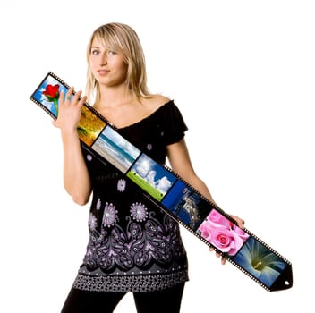 Sexy young woman folding film strip