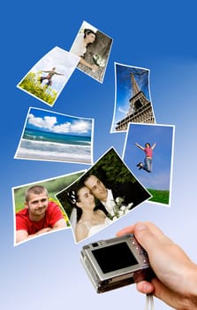 Digital camera and photographs against b