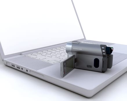 3D handy cam over a laptop isolated on white
