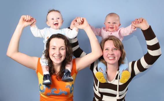 babies on mothers shoulders