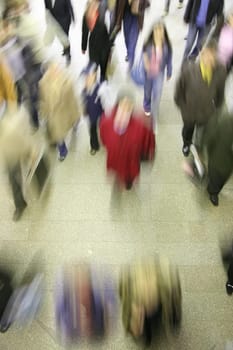 red woman in moving crowd