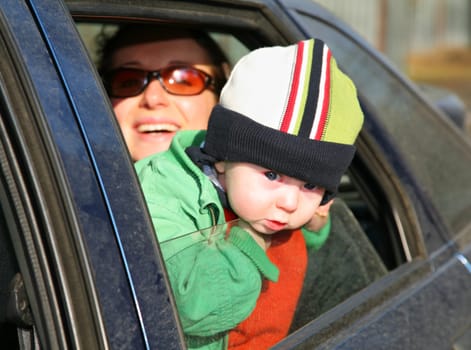 mother with baby in car