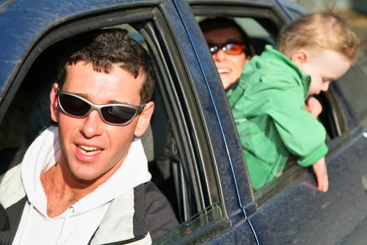 family in car