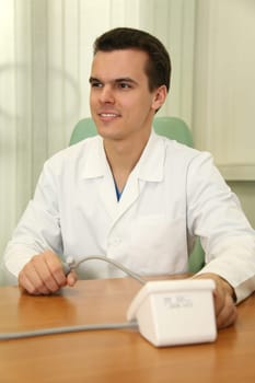 doctor with sphygmomanometer