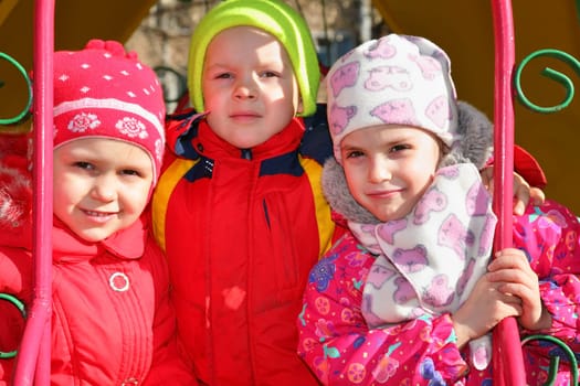 boy with girls in kindergarten