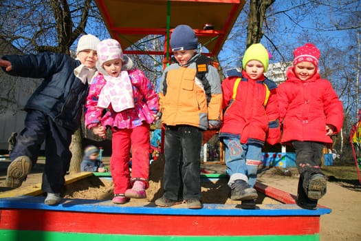team with leg up in kindergarten