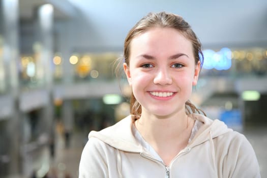 smile girl in big hall