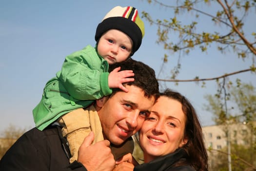 family with baby on shoulders 3