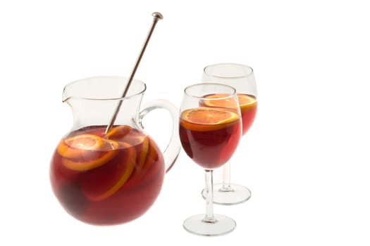 Red Wine Sangria in pitcher with stemware on white background