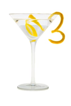 Martini mixed drink with lemon peel garnish on a white background