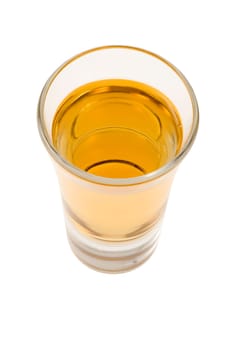 Whiskey neat in shot glass on white background