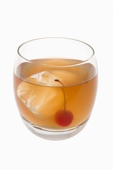 Whiskey Sour mixed drink with cherry garnish on white background