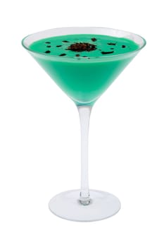 Grasshopper mixed drink with shaved chocolate garnish on white background
