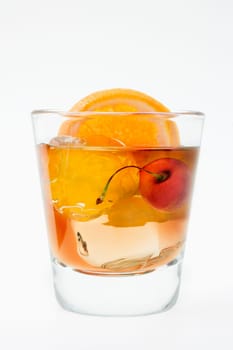 Old fashioned mixed drink on a white background