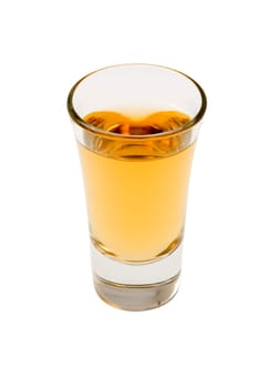 Whiskey neat in shot glass on white background