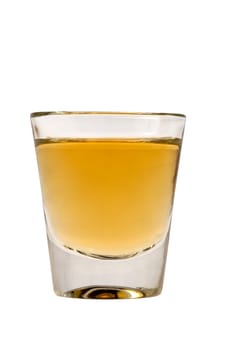Whiskey neat in shot glass on white background