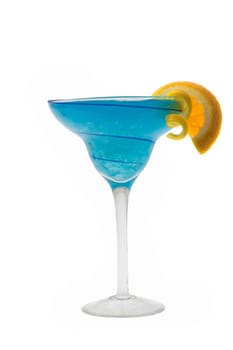 Blue Hawaiian mixed drink with orange and lemon garnish on white background
