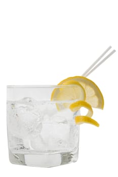 Club soda with lemon slice and peel garnish on white background
