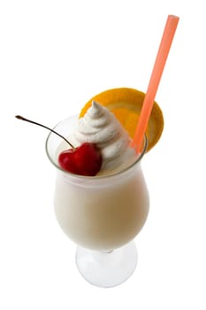 Pina Colada mixed drink with fruit garnish on white background