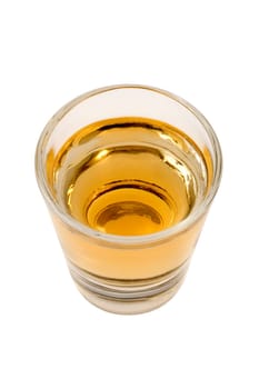 Whiskey neat in shot glass on white background