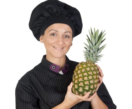 Pretty cook woman with pineapple