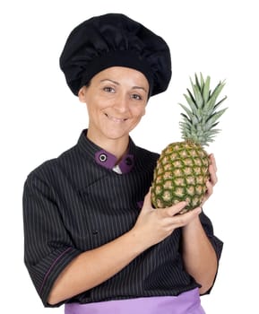 Pretty cook woman with pineapple