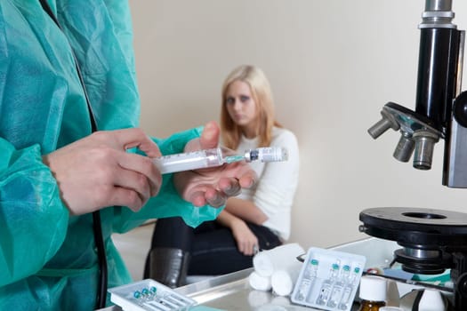 doctor listening to patients heartbeat