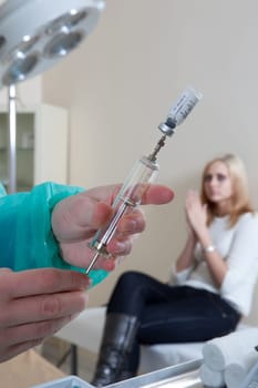doctor listening to patients heartbeat