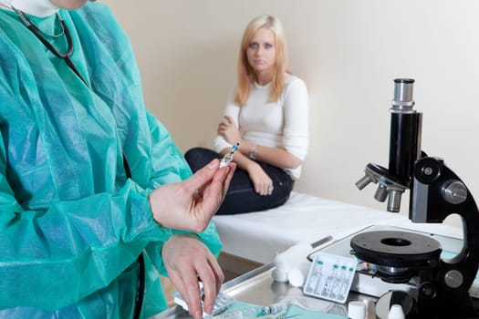 doctor listening to patients heartbeat