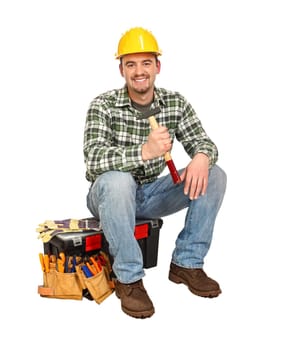 young handyman sit on toolbox
