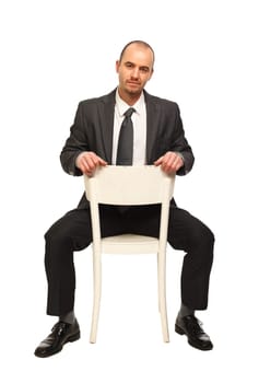 man sit on chair