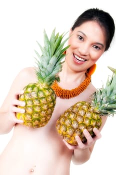 Asian woman with pineapples