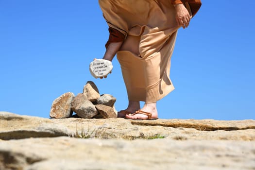 Him who is without sin cast the first stone