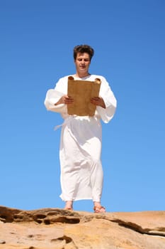 Man in robe reading