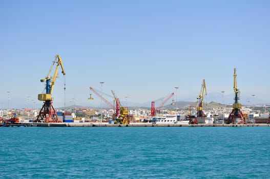 Cranes and loading equipment.