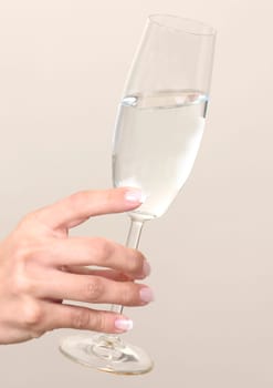 Hand with champagne glass
