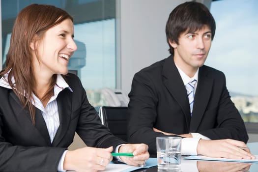 Businessman with assistant laughing