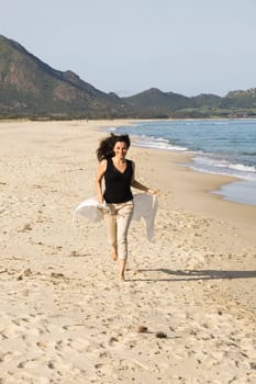 Woman running on the beach