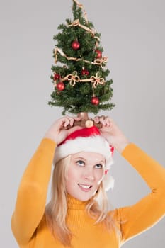 woman with christmas tree