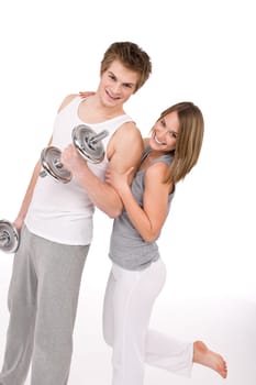 Fitness - happy couple with weights