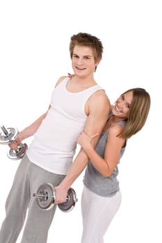 Fitness - happy couple with weights