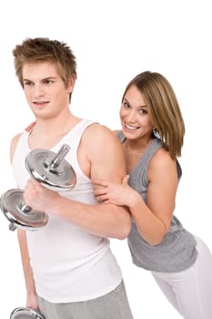 Fitness - happy couple with weights