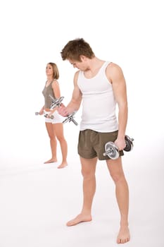 Fitness - happy couple with weights