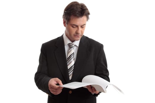 Businessman reading report or document