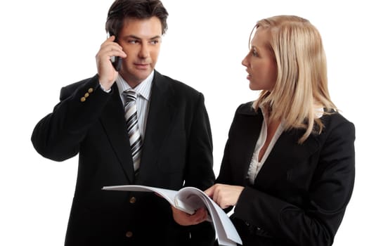 Business people discuss report
